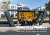 Futuristic Bus Shelter with LED Lighting and Backlit Advertising Display